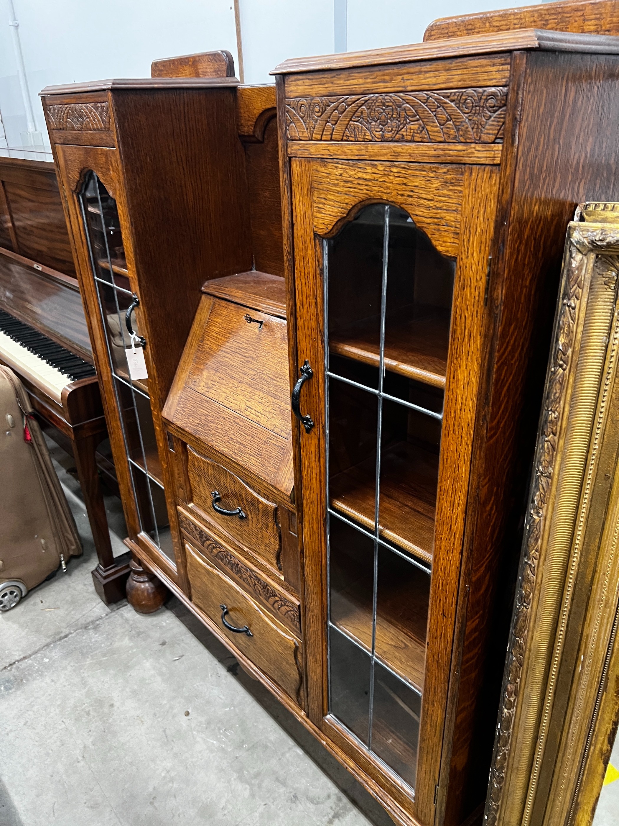 An early 20th century oak bureau bookcase, length 120cm, depth 28cm, height 154cm